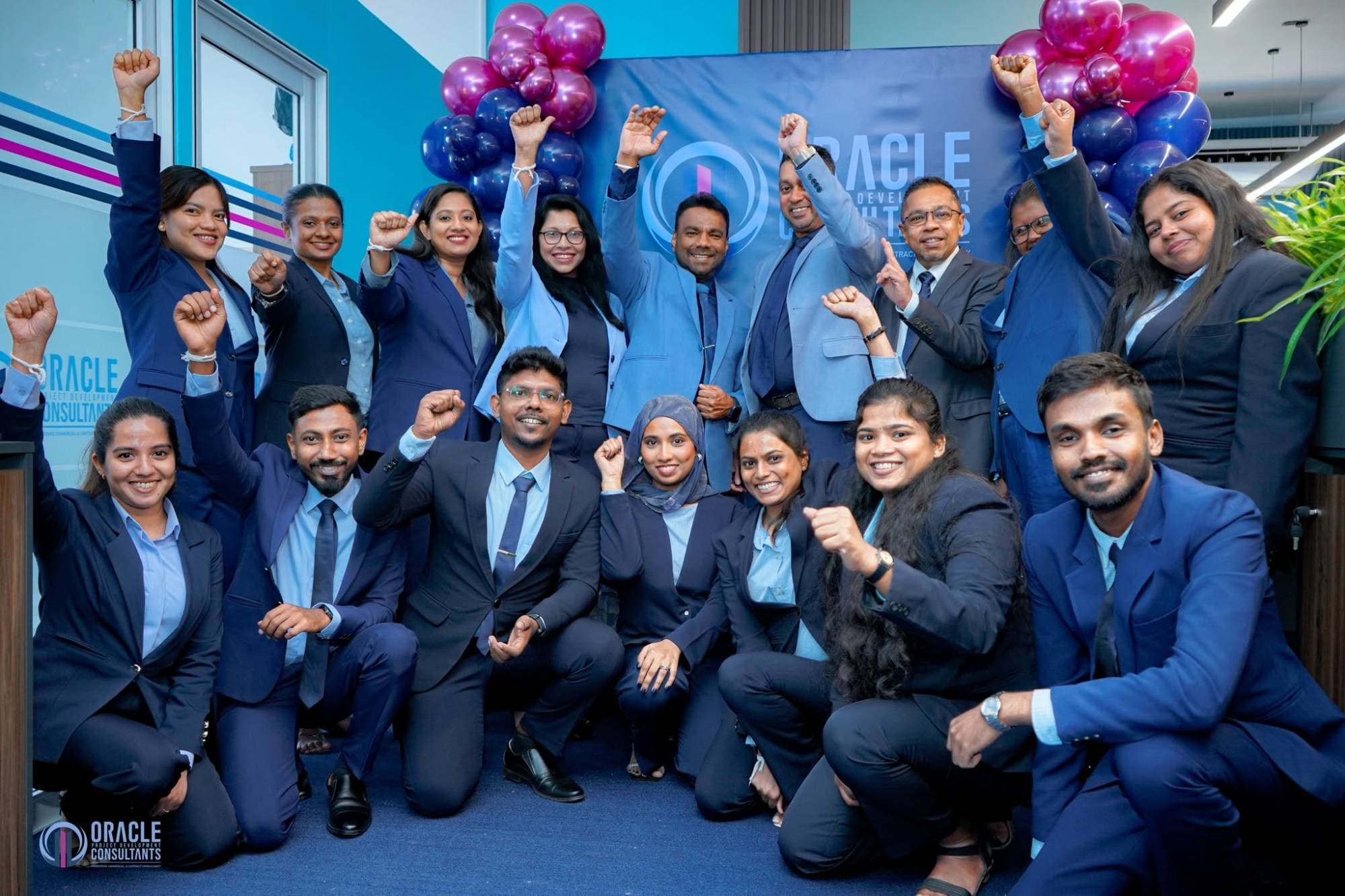 The Oracle team celebrating together at the office